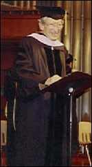 Claude giving acceptance speech for his doctorate on June 24, 1992